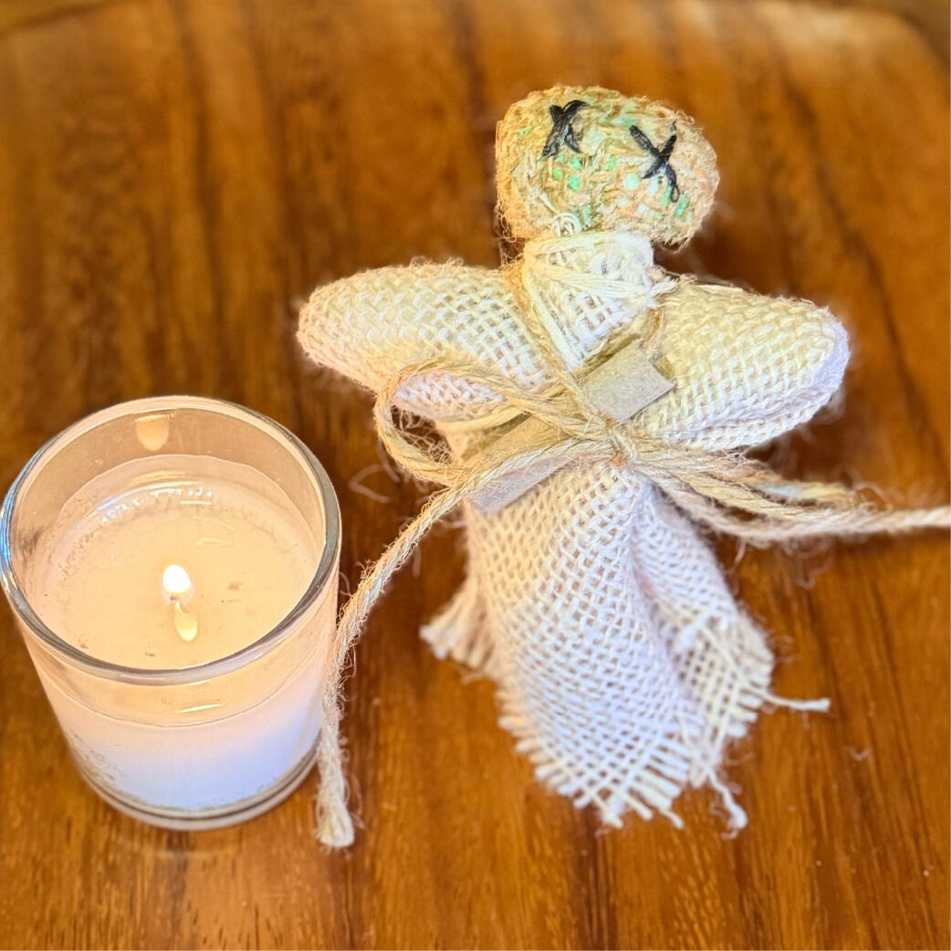 Cinderwitch - Say it once Single burlap Cinderwitch beside a lit candle, handmade wish-burning ritual figure by WMFrewolfe