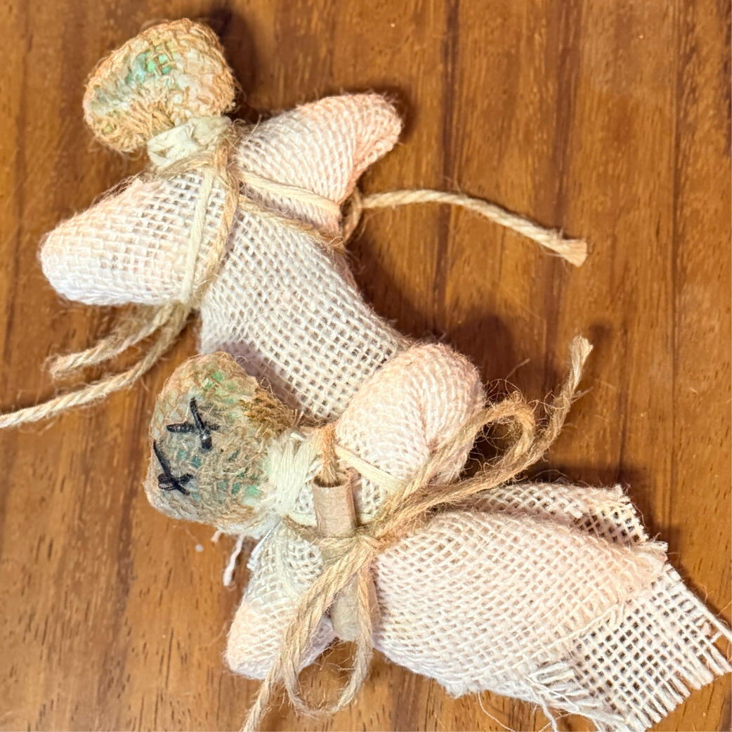 Cinderwitch - Each her own Two handmade Cinderwitch burning poppets, front and back, with X-stitched faces and burlap bodies, by WMFrewolfe
