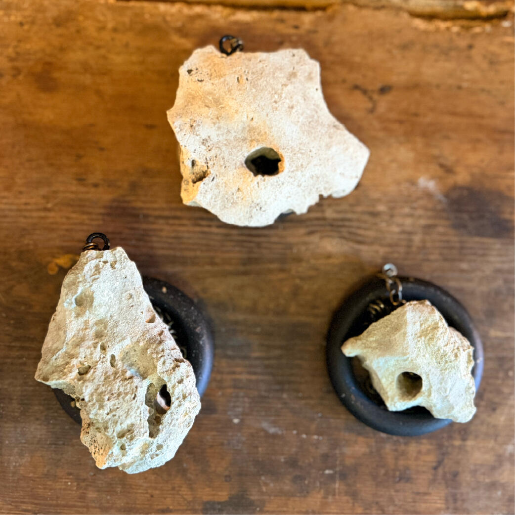 Hagulum - Each its own Three natural hagstones with holes worn by water, paired with dark rings, Hagulum by WMFrewolfe